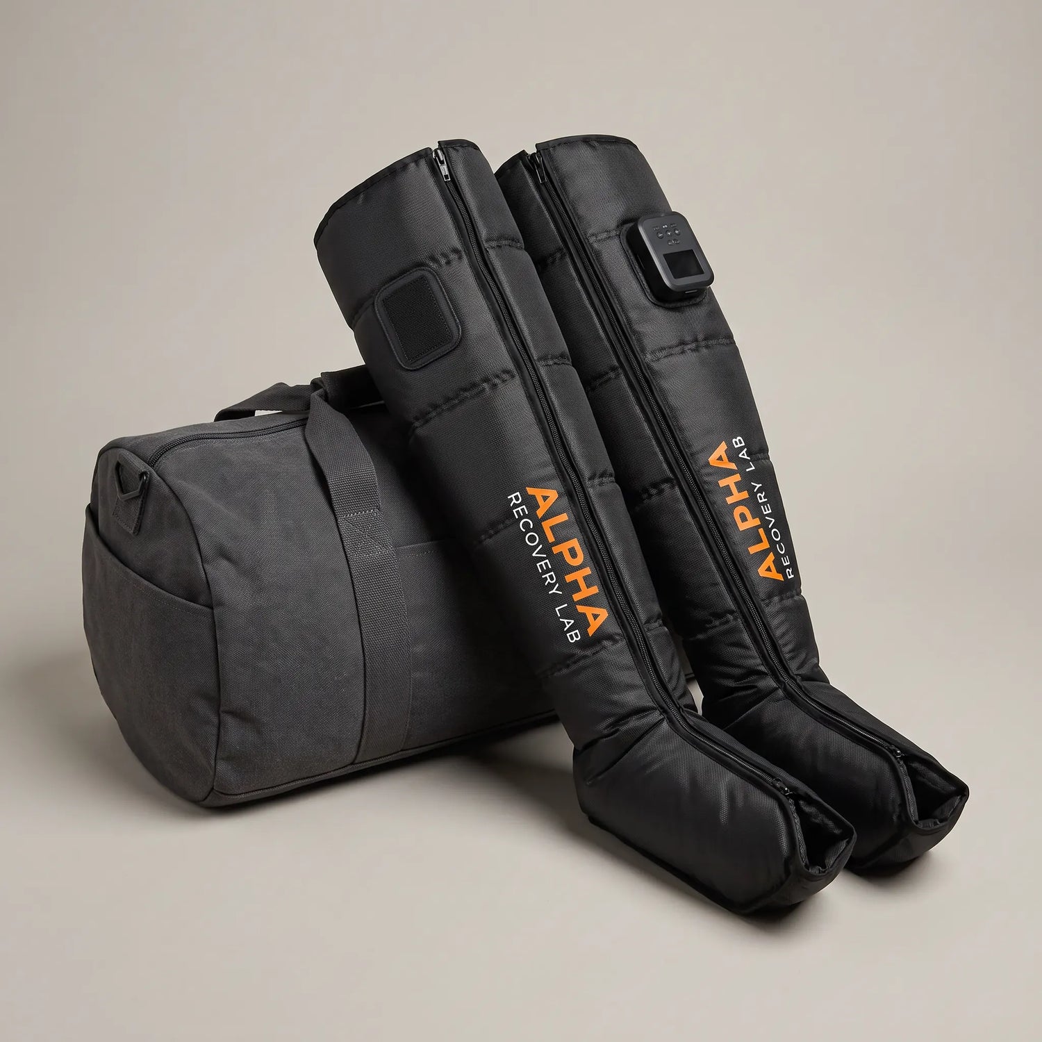 Folded AlphaFlow compression boots near a gym bag